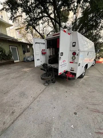 Magnet Plumbing service vehicle on-site for Grease Trap Cleaning in Bermuda Dunes